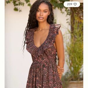 New Anthropologie Women's Ruffled dress in Black with pattern size large